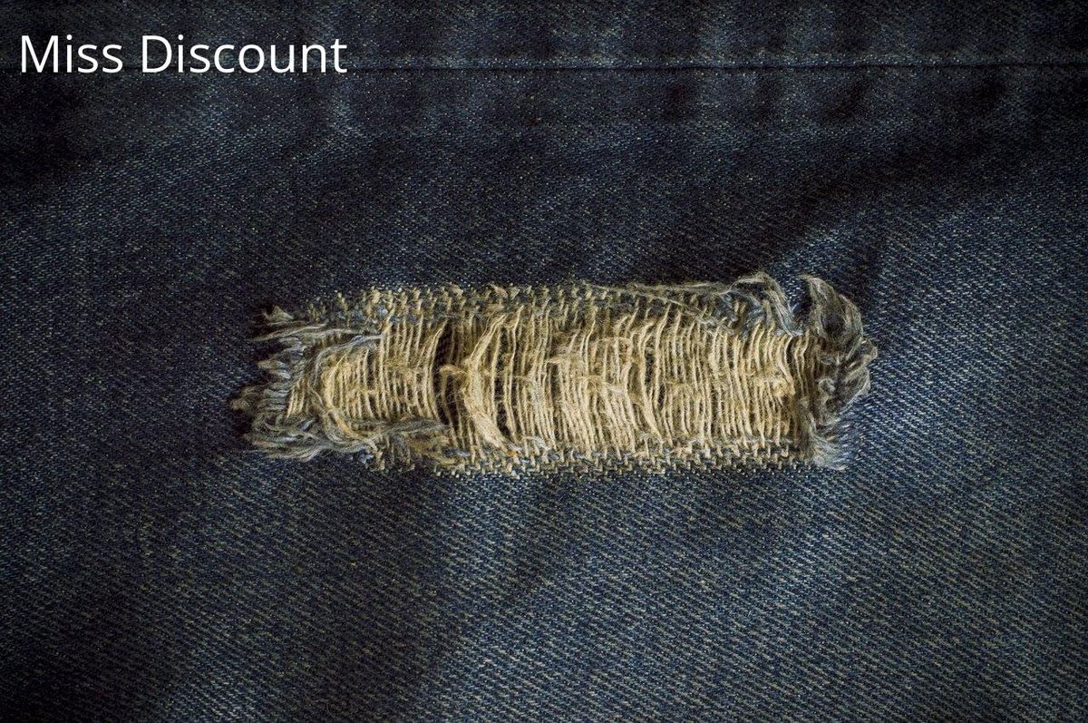 Réparation stylée pour vestes: la couture visible redonne vie au denim usé.